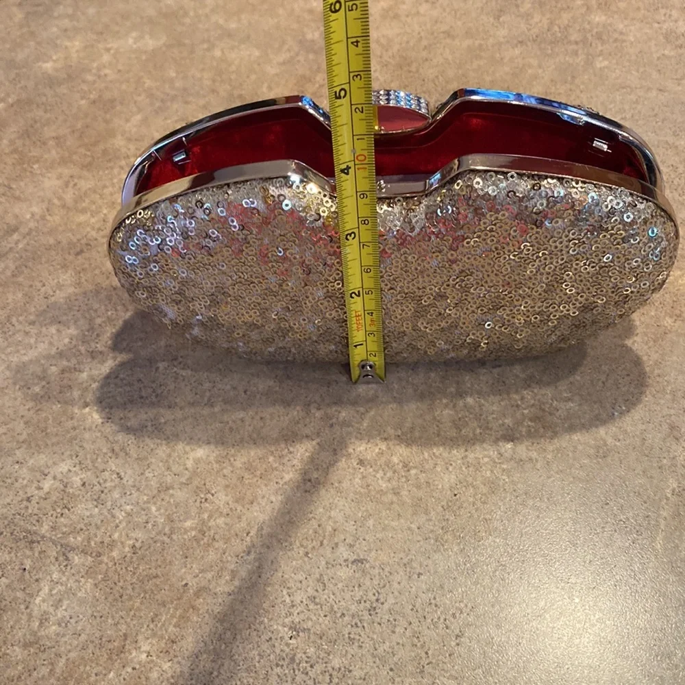 Womens gold clutch purse you can have the chain strap or tuck inside
